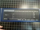 Netgear FSM726S 24 10/100 Mbps Managed Stackable Switch W/ Gbic Ports. Fixed Price $25.99.