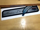 Aluma-lite Holiday Rambler 19X6" Silver Vintage Trailer Decal Canned Ham. Fixed Price $63.00.